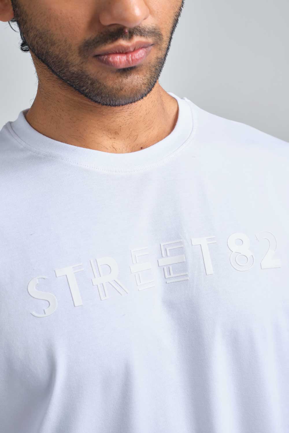 STREET82 large Logo - high build silicon print in front. Blue, black and white solid lycra jersey oversize T-shirt